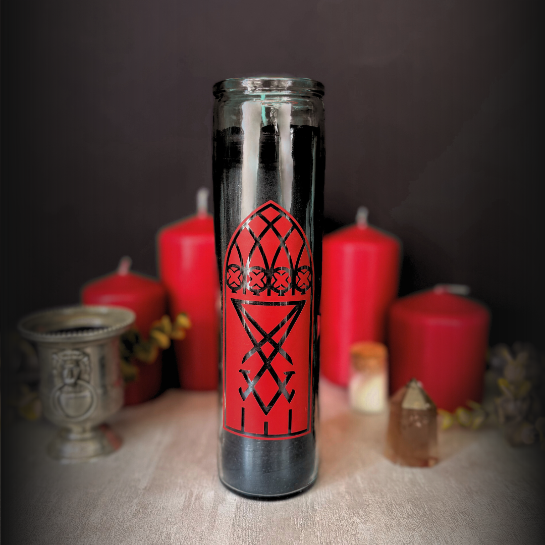 Black Lucifer Ritual Candle with Lucifer sigil in gothic window